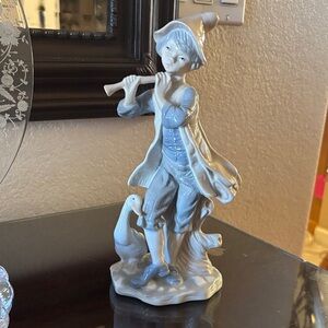 Elegant Ceramic Flute Player Figurine in Gray and Cream